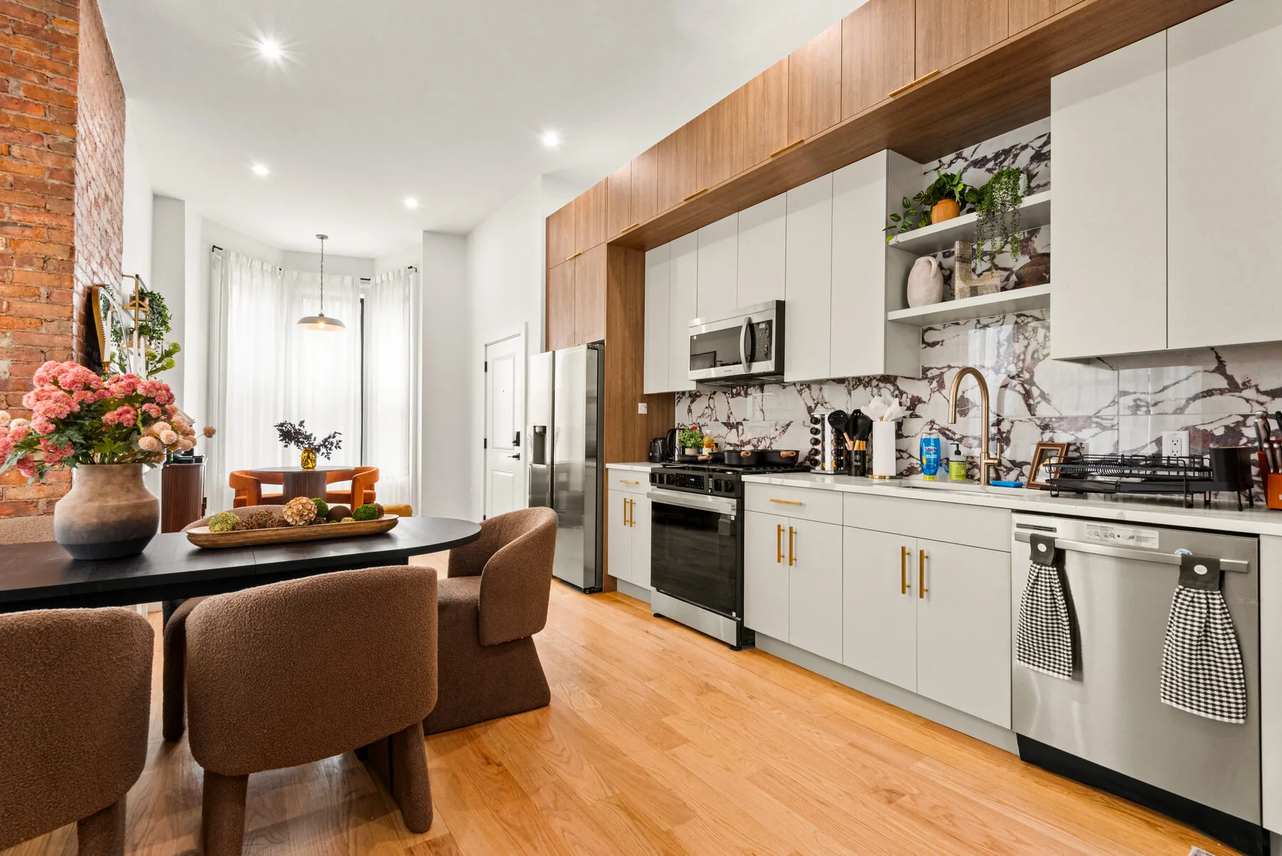 Open kitchen with marble backsplash