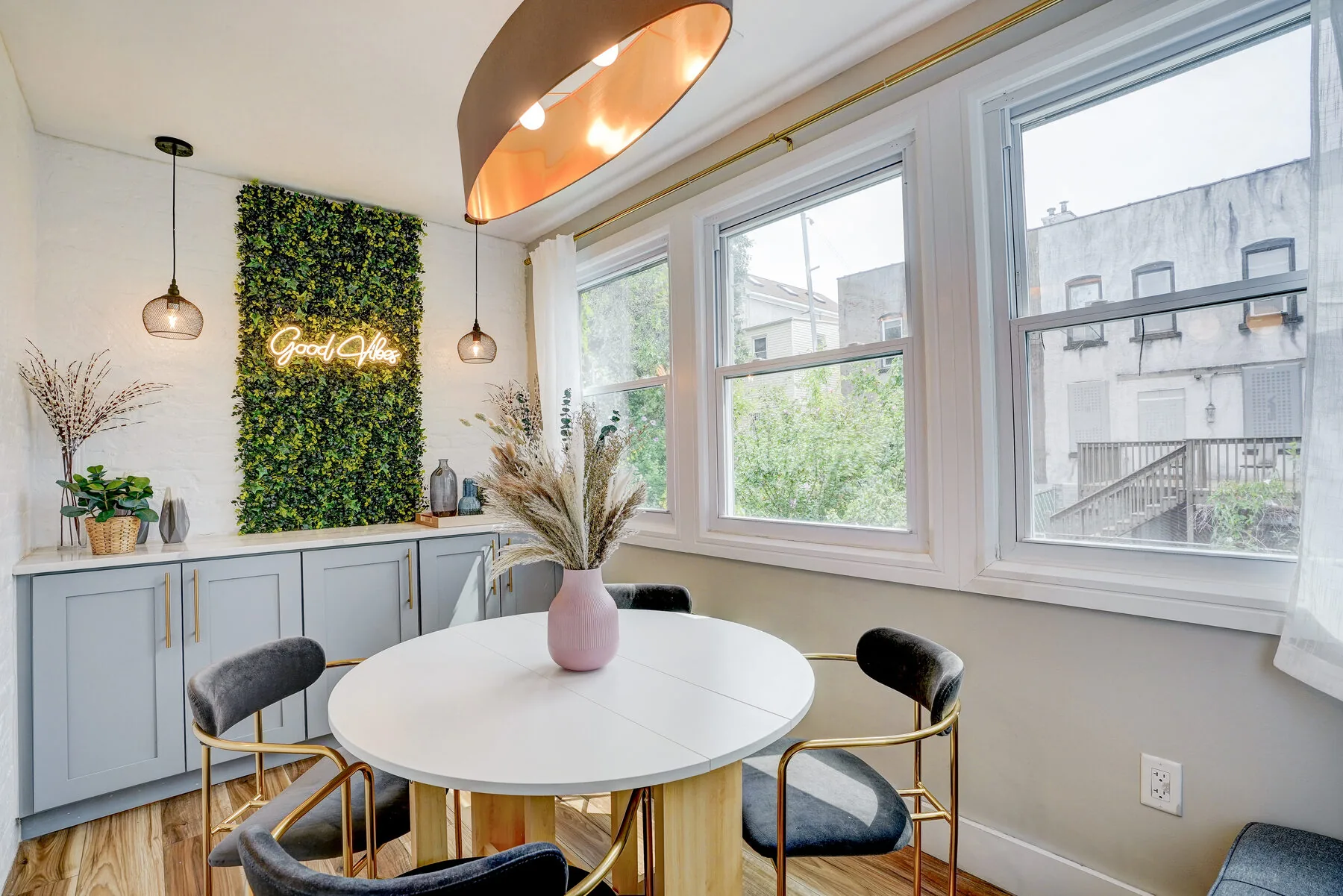 Sunroom dining with large windows