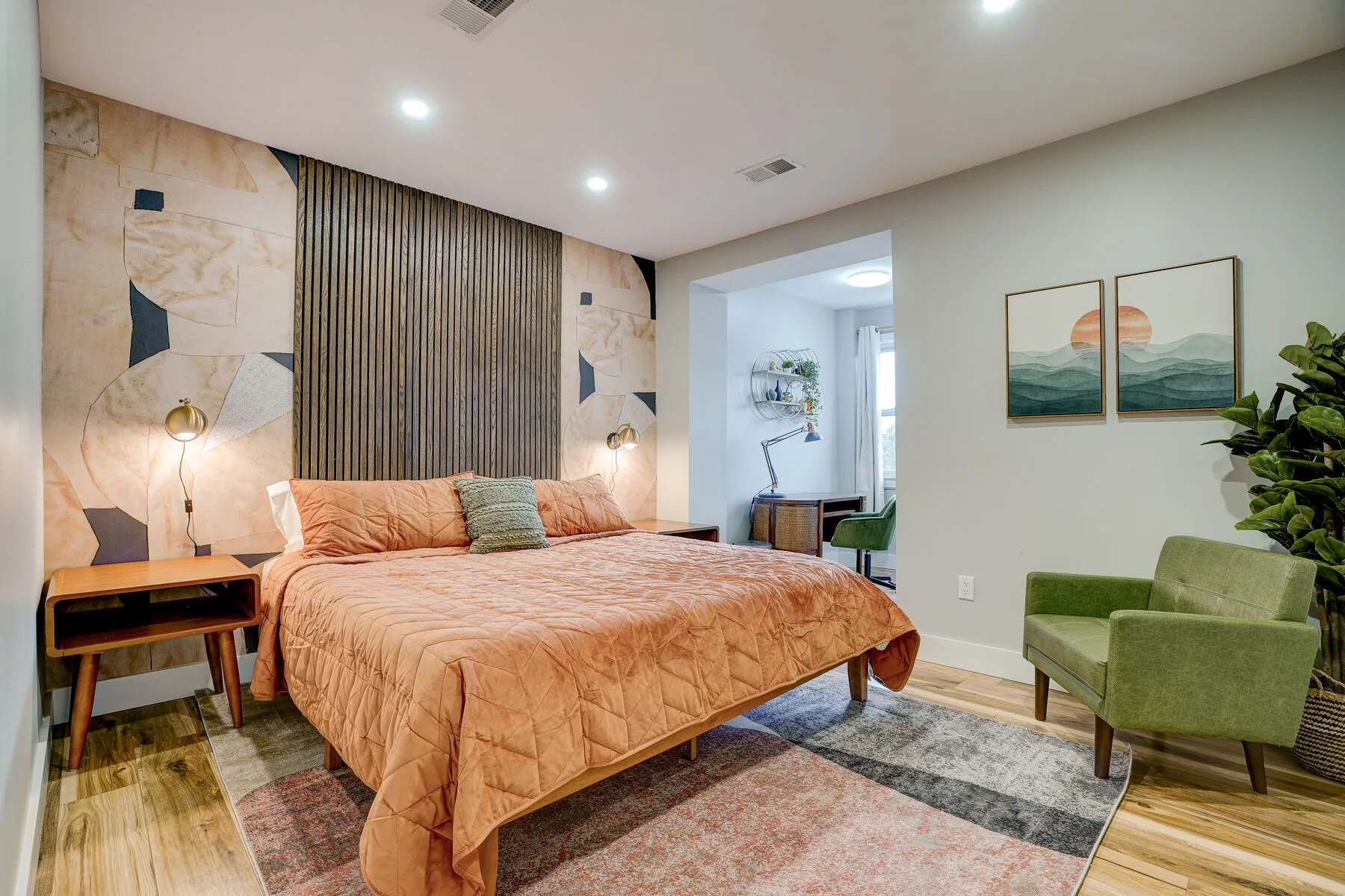 Master bedroom with geometric headboard wall